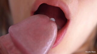 Her soft big lips and tongue cause him to cumshot, super closeup cum in mouth.