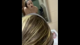 Cute girl gets bent over public bathroom sink.
