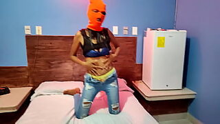 My brunette stepsister tells me she wants to celebrate Halloween in a hotel bed. She put on a mask and shakes her body and hips very sexy.
