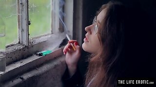 Angry girl in glasses with puffy nipples masturbates hard in the dirty alley.